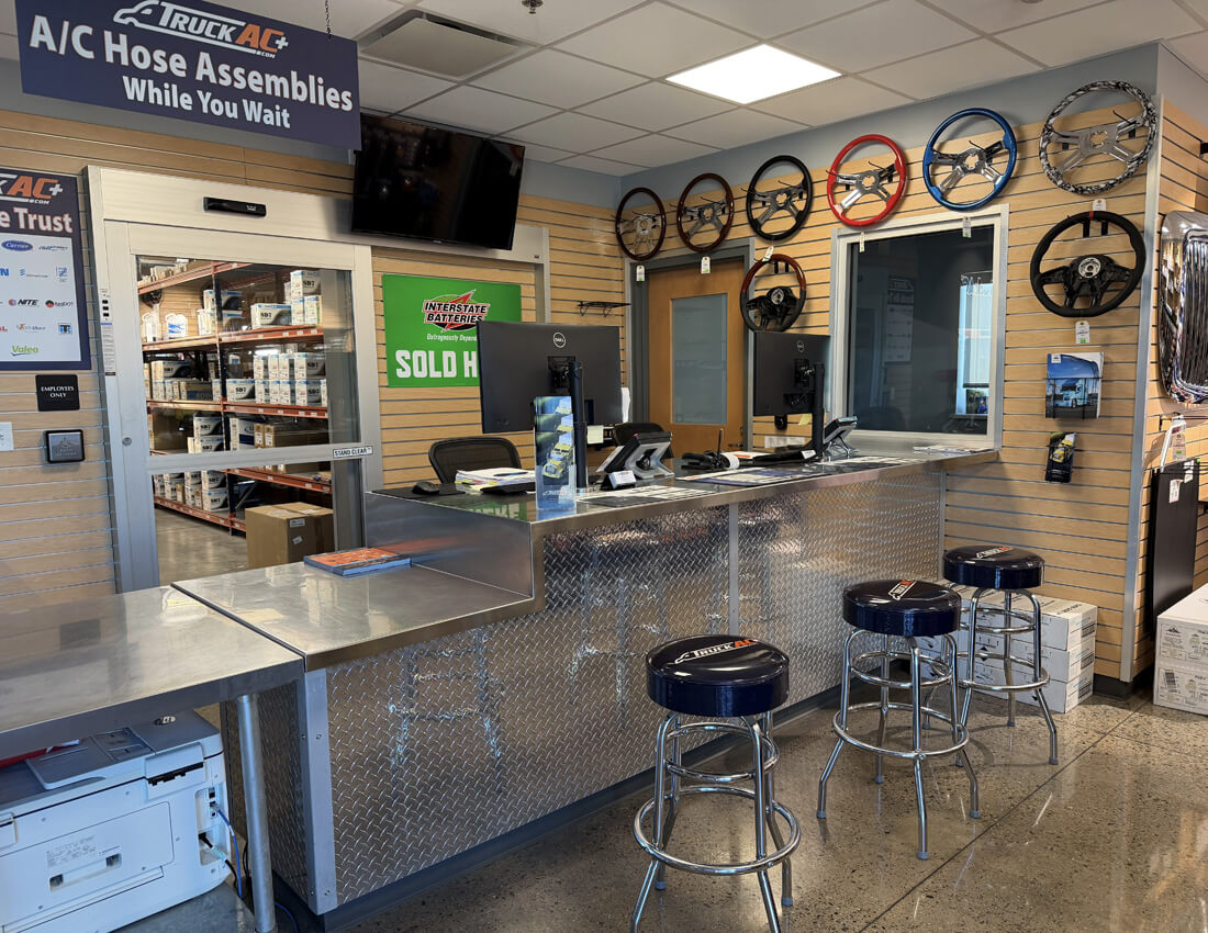 Parts and accessories aisle inside the TruckAC+ retail store in Dallas, Texas
